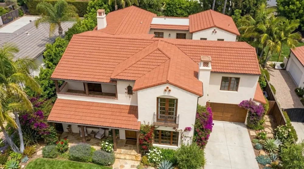 Application rendering showing Classic stone coated metal roofing on a multi-slope house